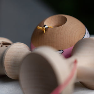 The metal bearing bead on a kendama.